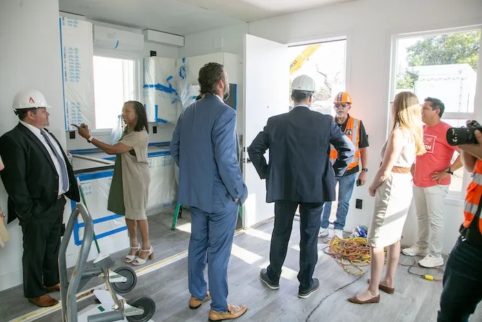 Community members tour a housing unit at "Caritas Casitas" in Oklahoma City on Tuesday, Aug. 13, 2024. Credit: Catholic Charities of the Archdiocese of Oklahoma City