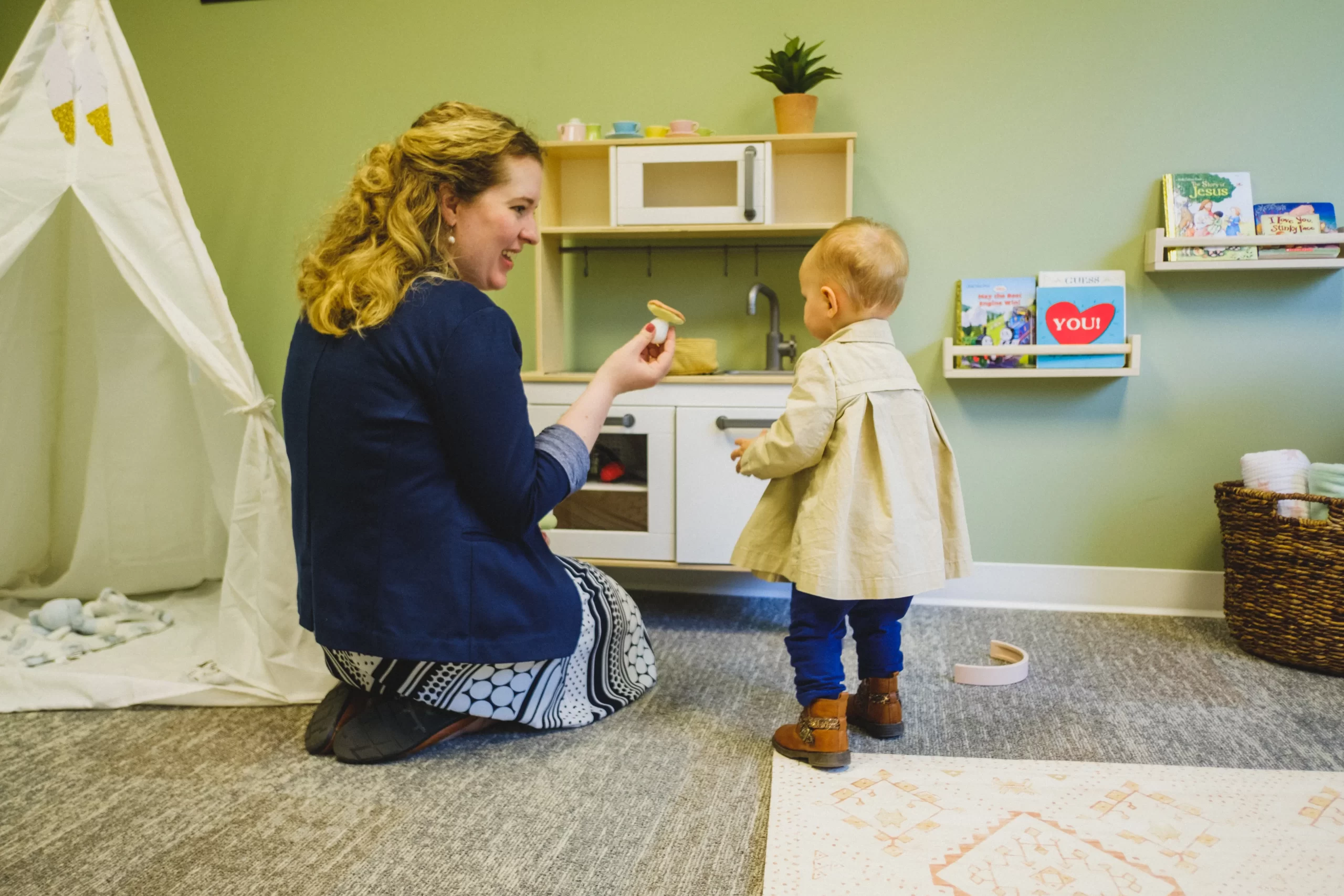 An Ascension employee with in the children's playroom at their headquarters. Credit: Courtesy of Ascension