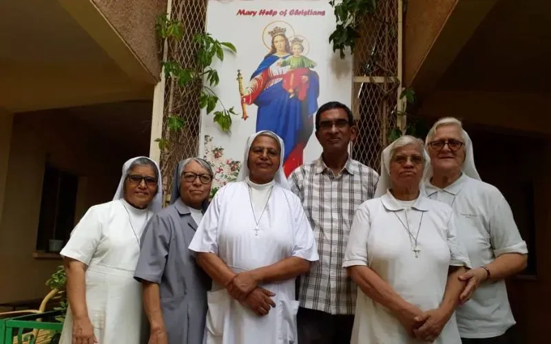 Father Jacob Thelekkadan with menbers of the Salesian Sisters in Sudan at Dar Mariam, the residence of the sisters, which has taken heavy fire in the war. Credit: Father Jacob Thelekkadan