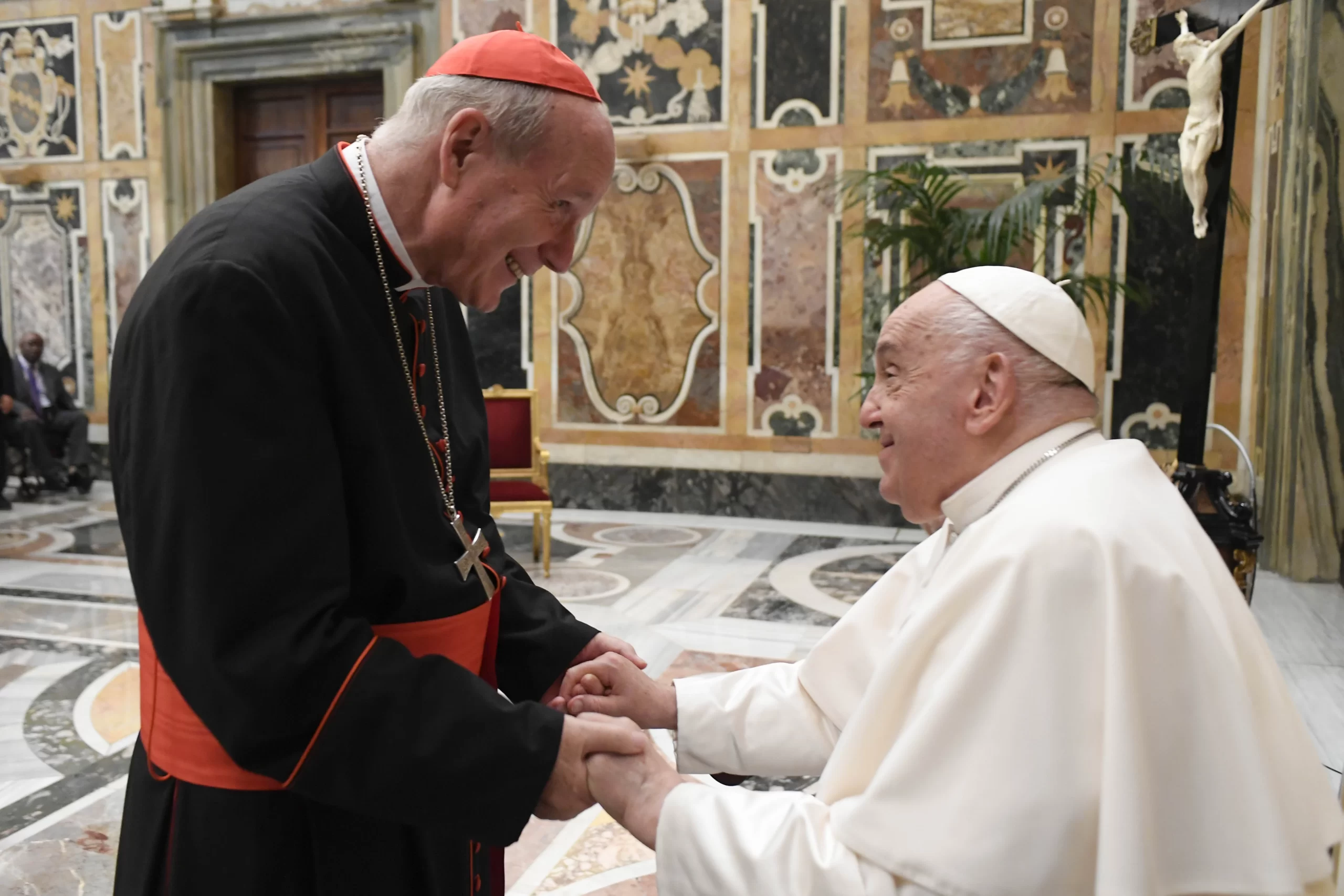 Pope Francis and Cardinal Christoph Schönborn, the archbishop of Vienna, greet each other during an audience with the International Catholic Legislators Network in the Clementine Hall of the Vatican on Aug. 24, 2024. Credit: Vatican Media