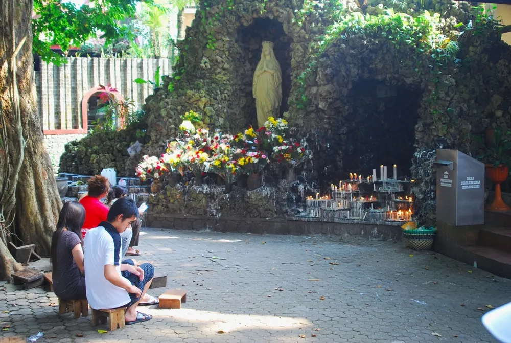 Gua Maria Sendangsono is a pilgrimage site of Goa Maria located in Banjaroyo Village, Kalibawang District, Kulon Progo Regency, DI Yogyakarta. Credit: Agustinus Argodiantoro/Shutterstock