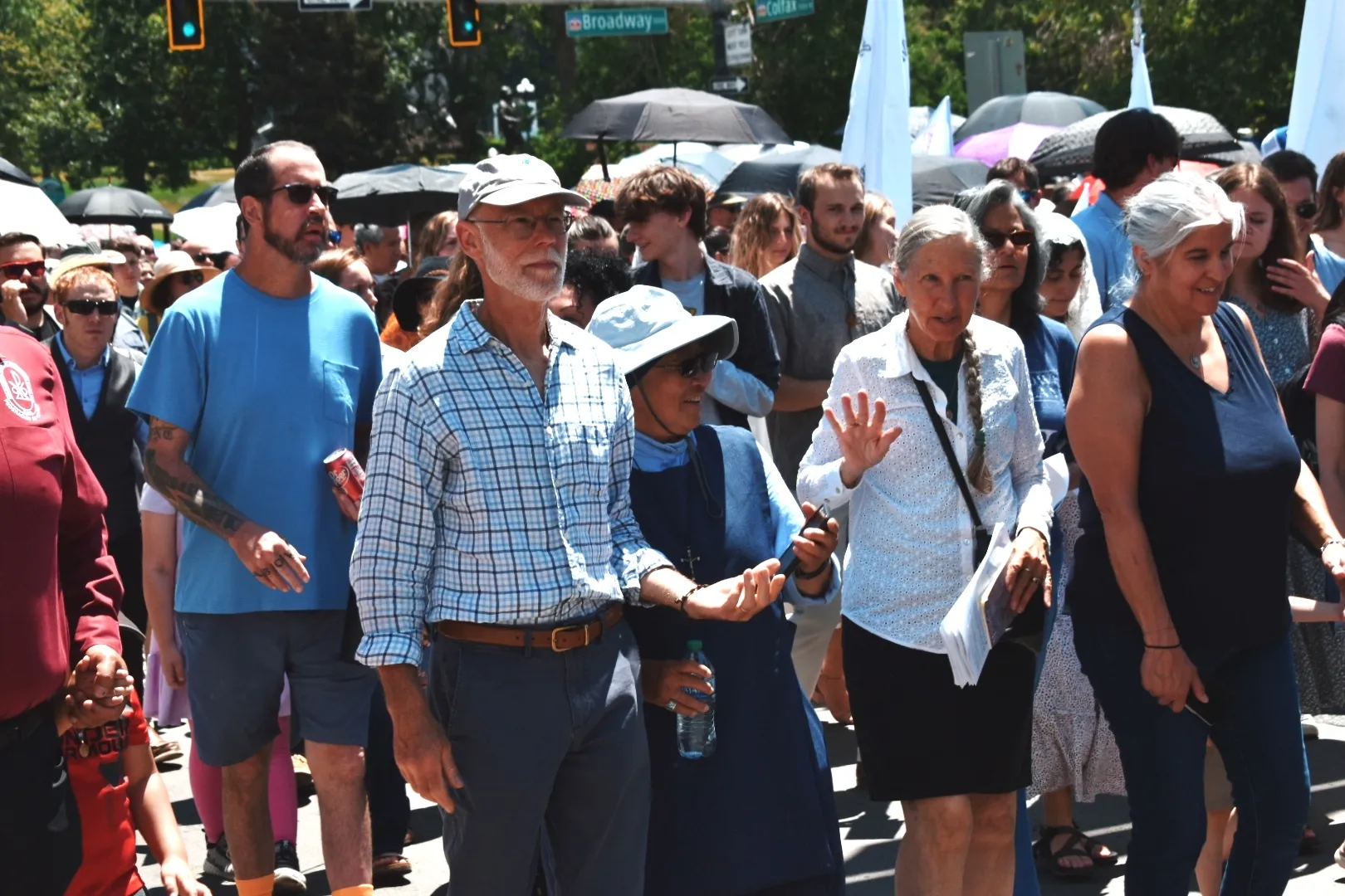 Sister Mary Rose Chinn (center) participates in a Eucharistic procession in downtown Denver that brought nearly 5,000 people on June 9, 2024. Credit: Kate Quiñones/CNA