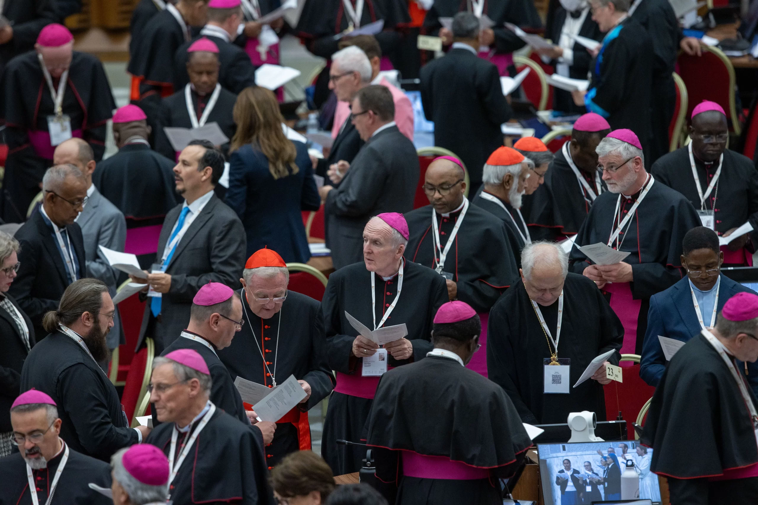 Participants read prayers during the first meeting of the full assembly of the Synod on Synodality on Oct. 2, 2024. Credit: Daniel Ibañez/CNA