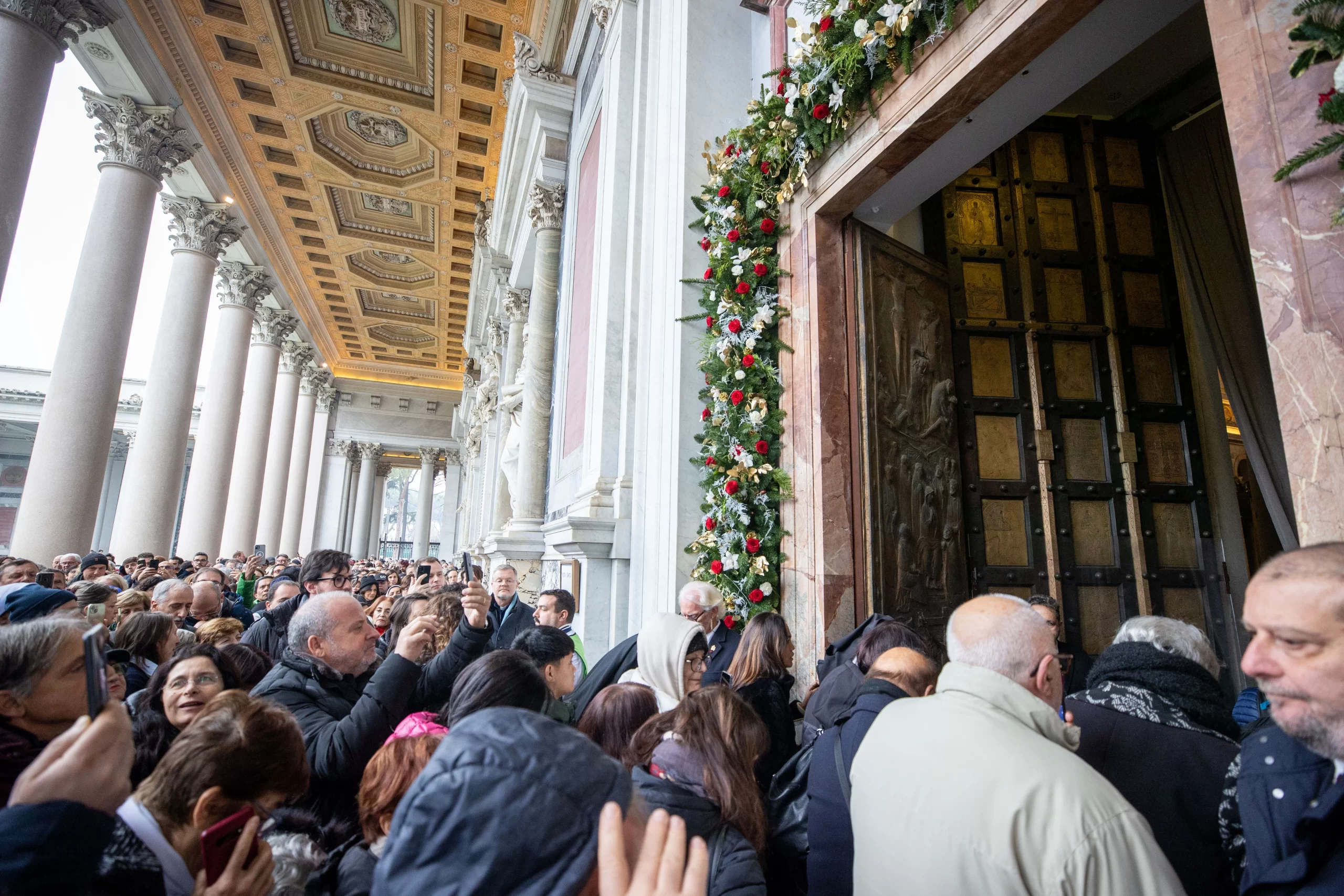 Pilgrims pass through the holy door at the Basilica of St. Paul's Outside the Walls on Jan. 5, 2025. Credit: Daniel Ibañez/CNA