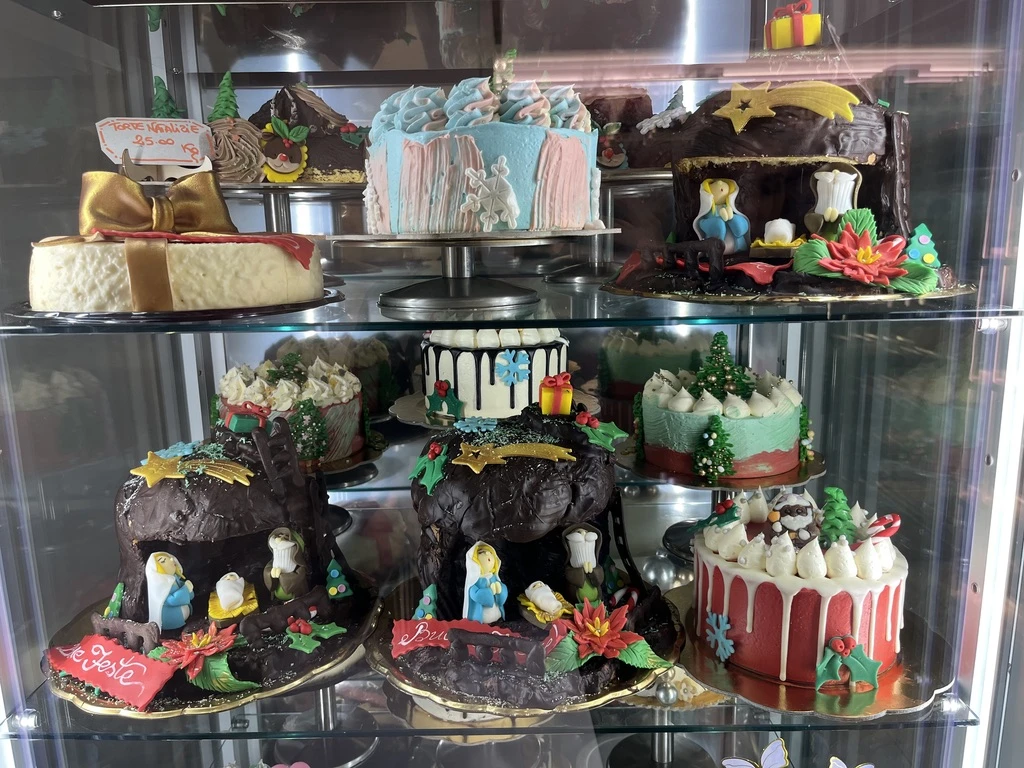 Cakes are seen on display in a bakery in Rome, Italy, Dec. 17, 2024. Credit: Courtney Mares/CNA