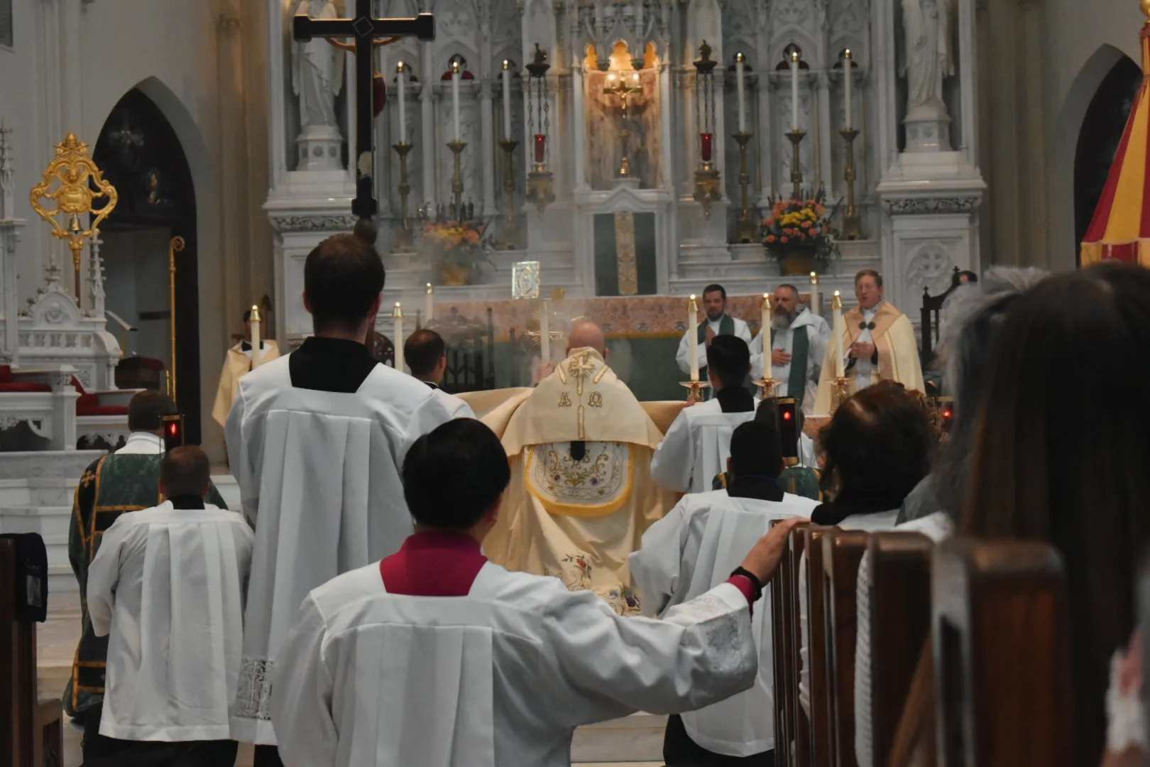 Archbishop Samuel Aquila prepares the monstrance for the procession at the Cathedral Basilica of the Immaculate Conception in Denver on June 9, 2024. Credit: Kate Quiñones/CNA