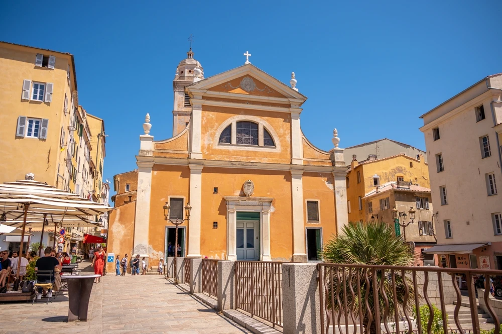 The exterior of the landmark Cathedral Santa Maria Assunta (Cathedral of Our Lady of the Assumption) in Ajaccio, Corsica, on Aug. 8, 2024. Credit: Jeff Whyte/Shutterstock