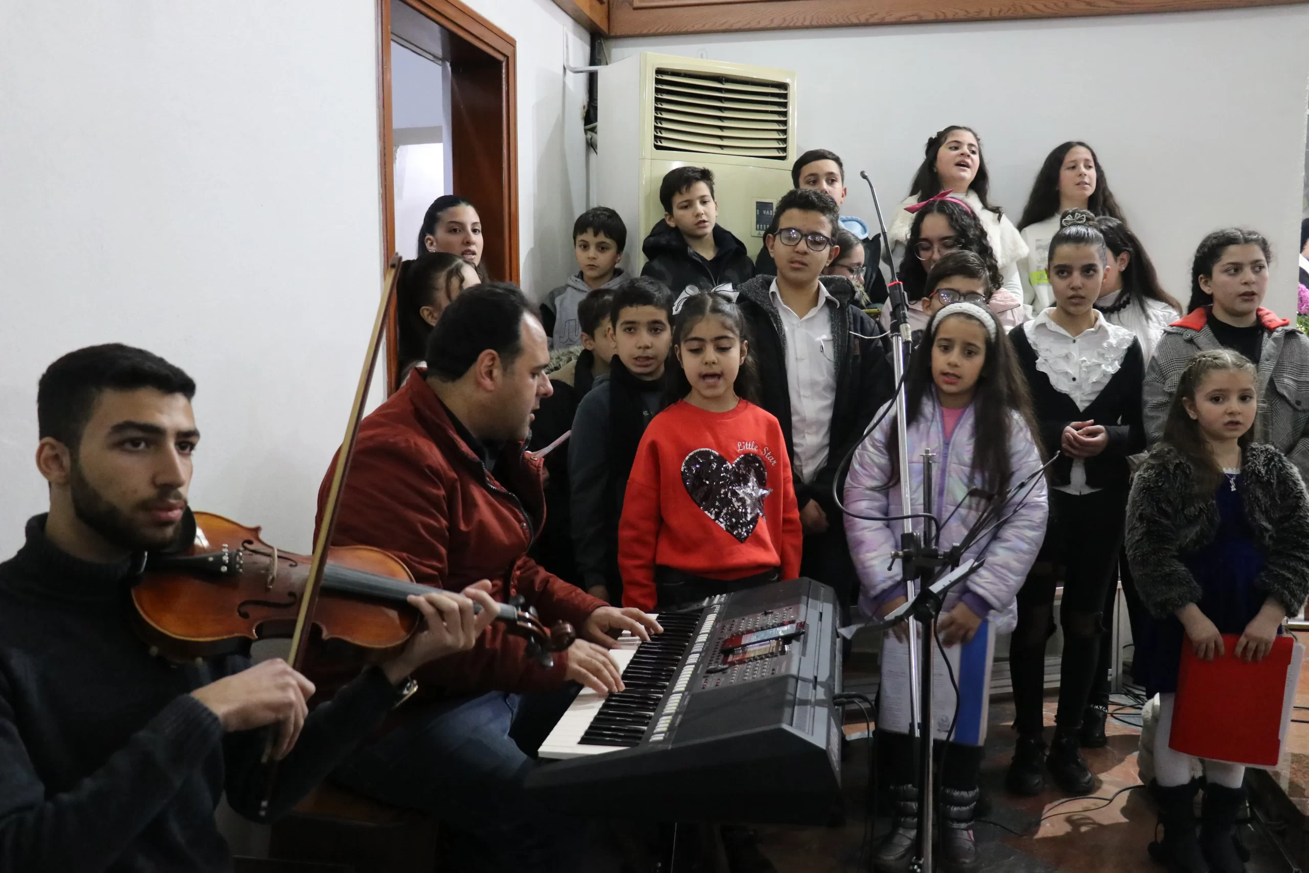 A youth choir performs at the Divine Liturgy at the Church of St. Paul’s Shrine in Tabbaleh, Damascus, on Jan. 25, 2025. Credit: ACI MENA