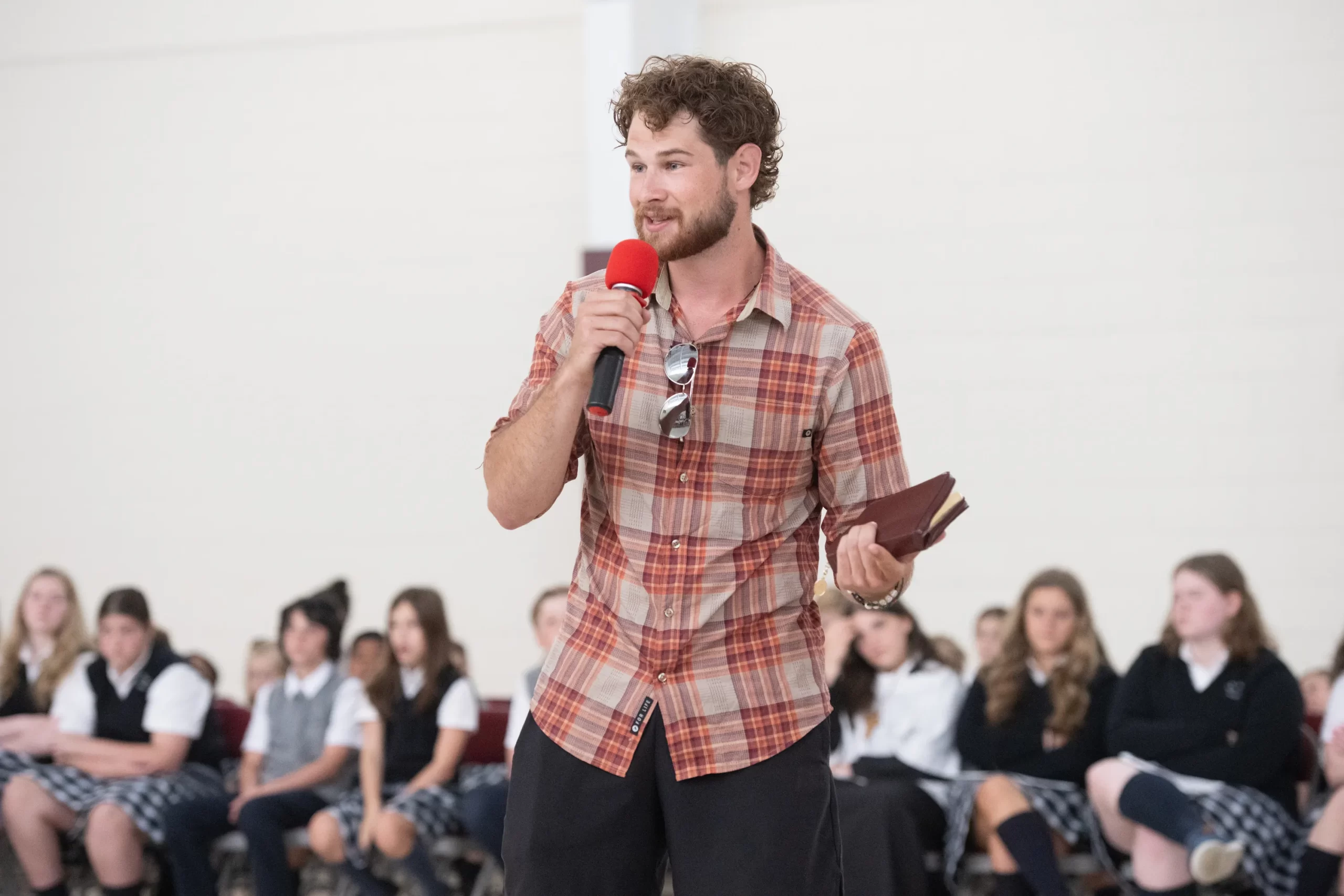 Perpetual Pilgrim, Dominic Carstens, speaks to school children about the real presence of Jesus in the Eucharist at St. Mary of the Pines Church, Manahawkin, New Jersey, May 29, 2024. Credit: Jeffrey Bruno