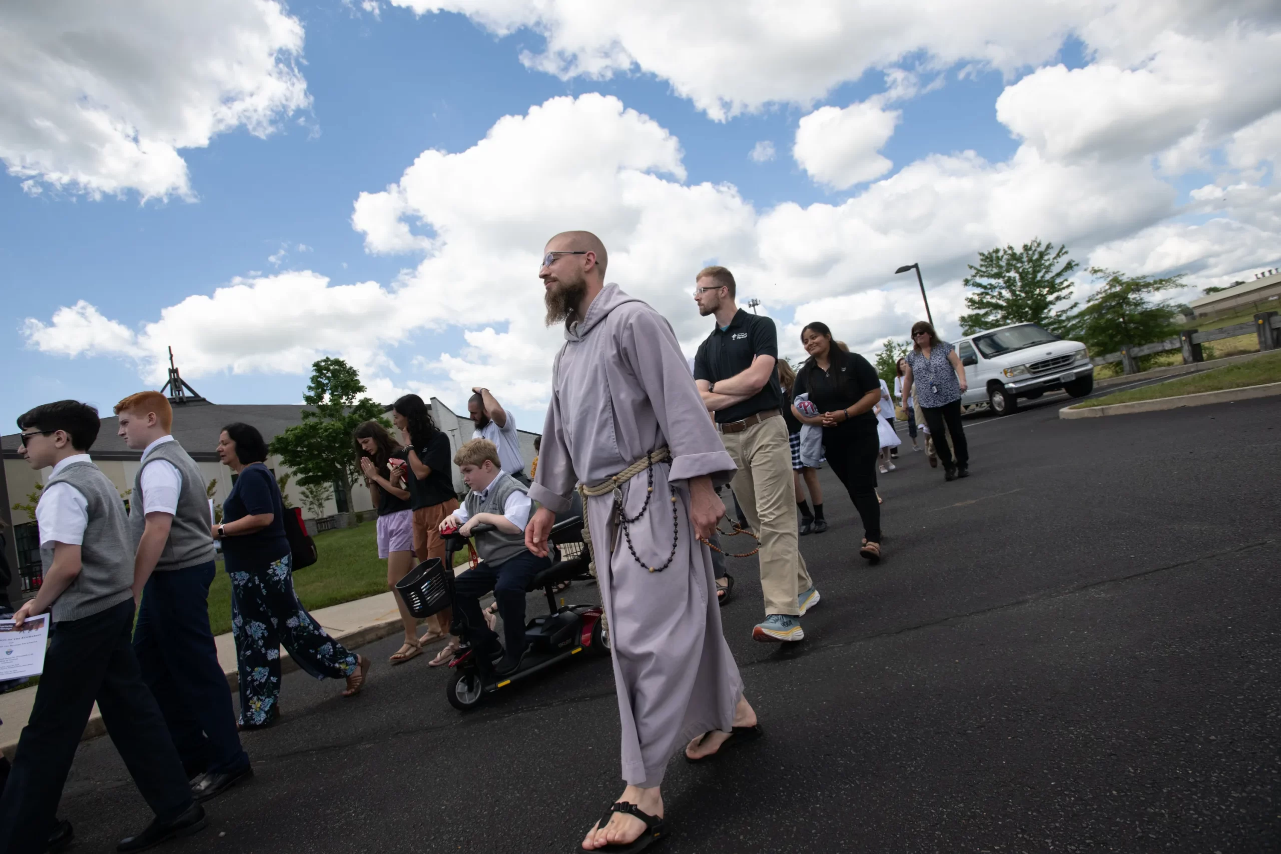 Perpetual Pilgrims of the National Eucharistic Pilgrimage travel in procession with the students of the Diocese of Trenton at St. Mary of the Pines Church, Manahawkin, New Jersey, May 29, 2024. Credit: Jeffrey Bruno