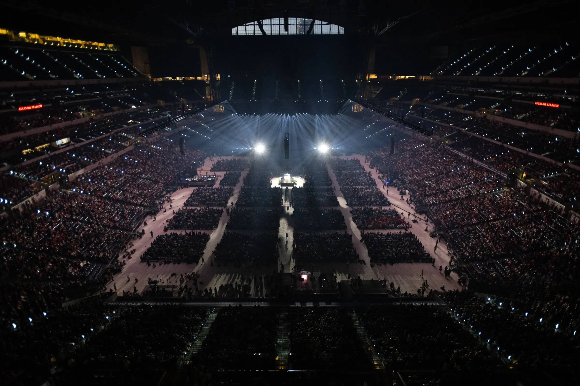 More than 50,000 kneel in adoration of the Eucharist at the National Eucharistic Congress held at Lucas Oil Stadium in downtown Indianapolis. Credit: Jeffry Bruno