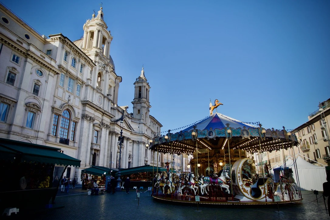 A carousel is seen on the streets of Rome, Italy, Tuesday, Dec. 17, 2024. Credit: Courtney Mares/CNA