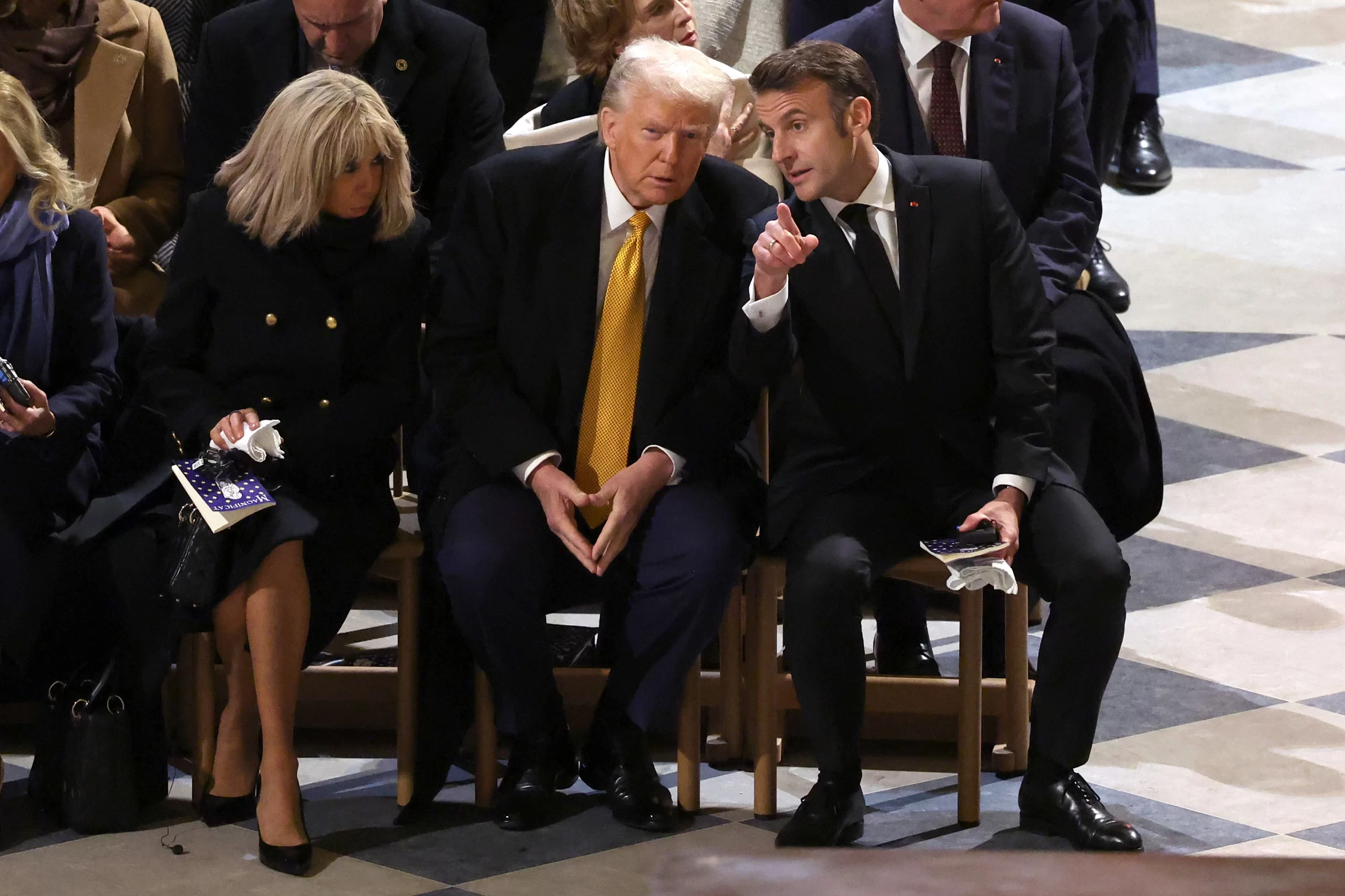 Brigitte Macron, U.S. President-elect Donald Trump, and President of France Emmanuel Macron attend the ceremony to mark the reopening of Notre-Dame of Paris Cathedral on Dec. 7, 2024, in Paris. Credit: Pascal Le Segretain/Getty Images for Notre-Dame de Paris