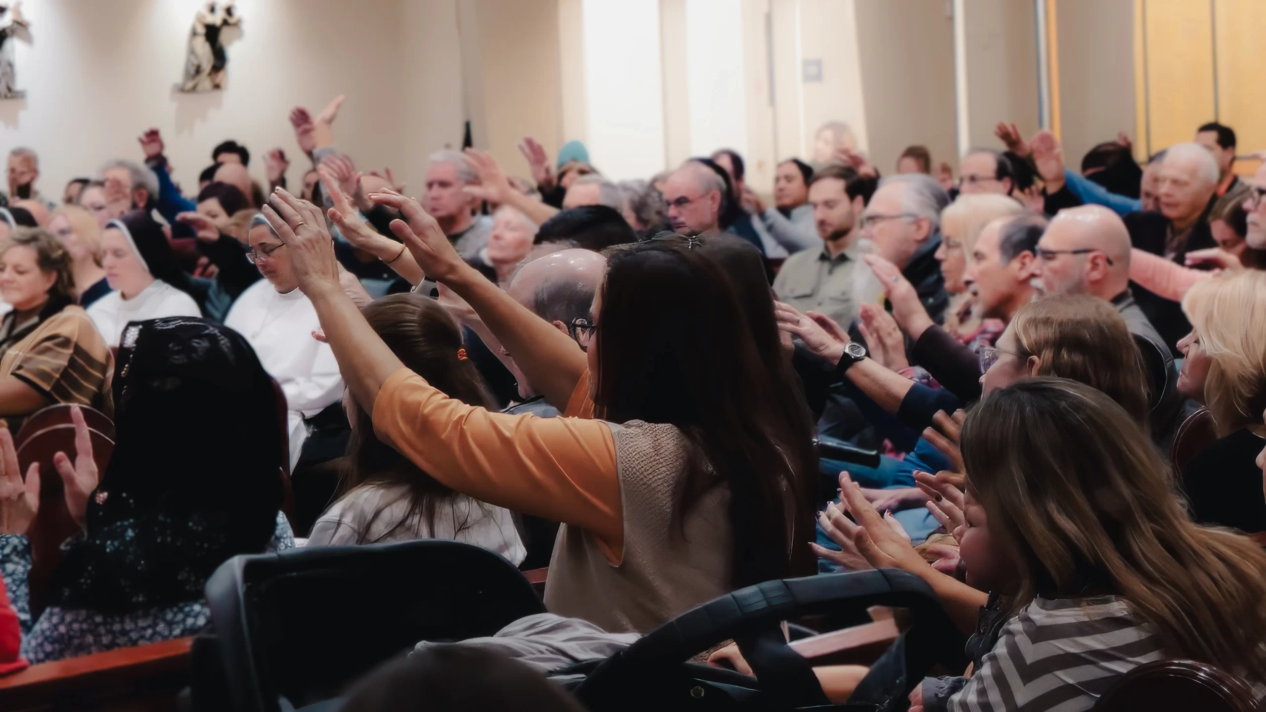 Participants are led through a prayer for those wanting to receive healing during a healing service led by Father Mathias Thelen of Encounter Ministries at St. Patrick Catholic Church in Brighton, Michigan, on Dec. 6, 2024. Credit: Photo courtesy of Jessica Morehead