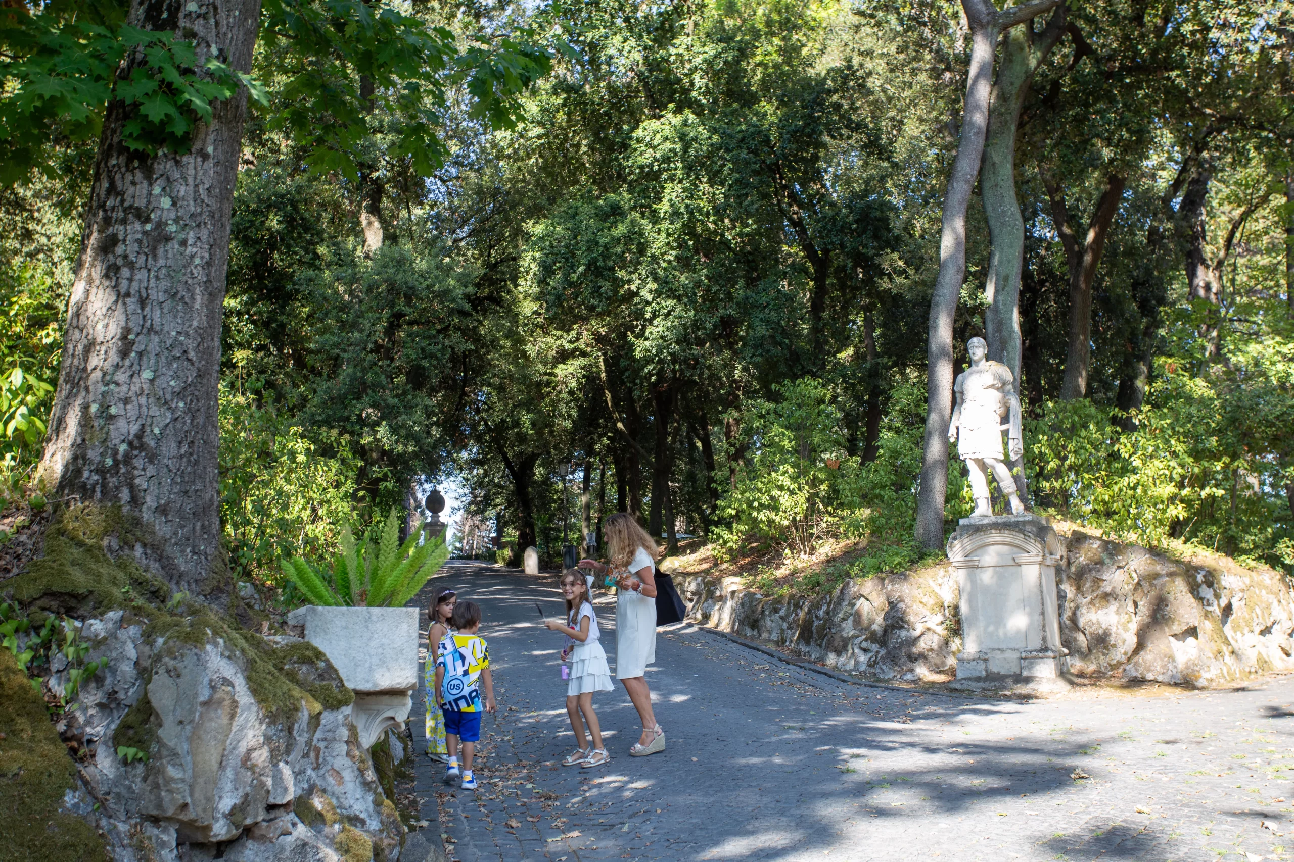 Isabella Salandri with young visitors at the Vatican Gardens in Vatican City, Aug. 23, 2024. Credit: Hannah Brockhaus/CNA