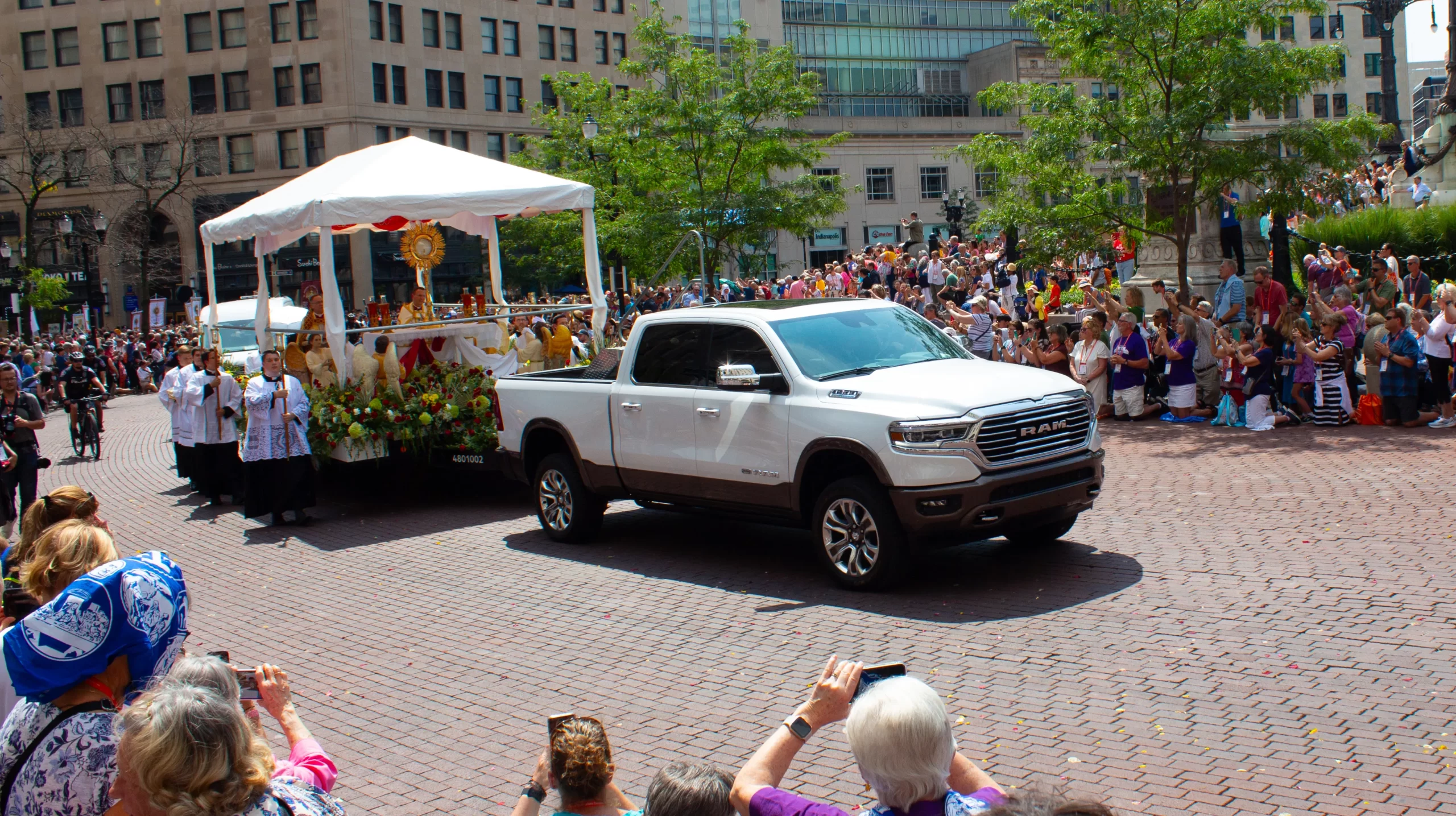 A truck pulls a float with a monstrance during the Indianapolis Eucharistic procession at the 2024 National Eucharistic Congress in Indianapolis, Indiana. July 2024. Credit: Jonah McKeown/CNA