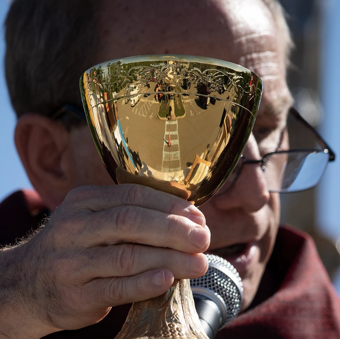 Father Kenard Tuzenue celebrates Mass in the parking lot of St. Mary's Parish in Barnegat/Manahawkin, New Jersey. Credit: Jeffrey Bruno