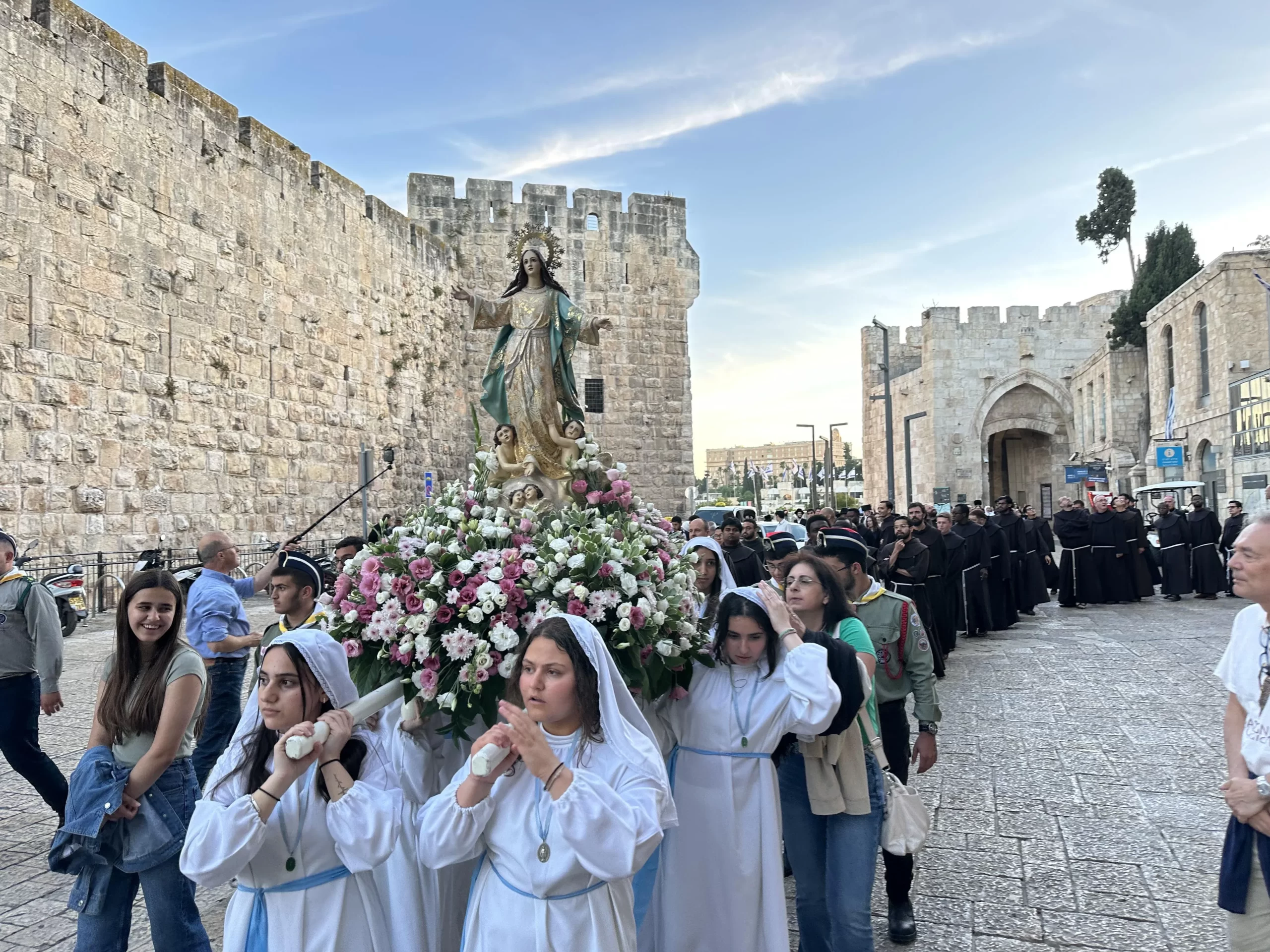 Palestinian Christians participate in a Marian procession on May 31, 2024, near the Church of the Holy Sepulcher in the Old City of Jerusalem to ask Our Lady of Palestine to intercede for peace in war-torn Gaza. Credit: Rafi Ghattas