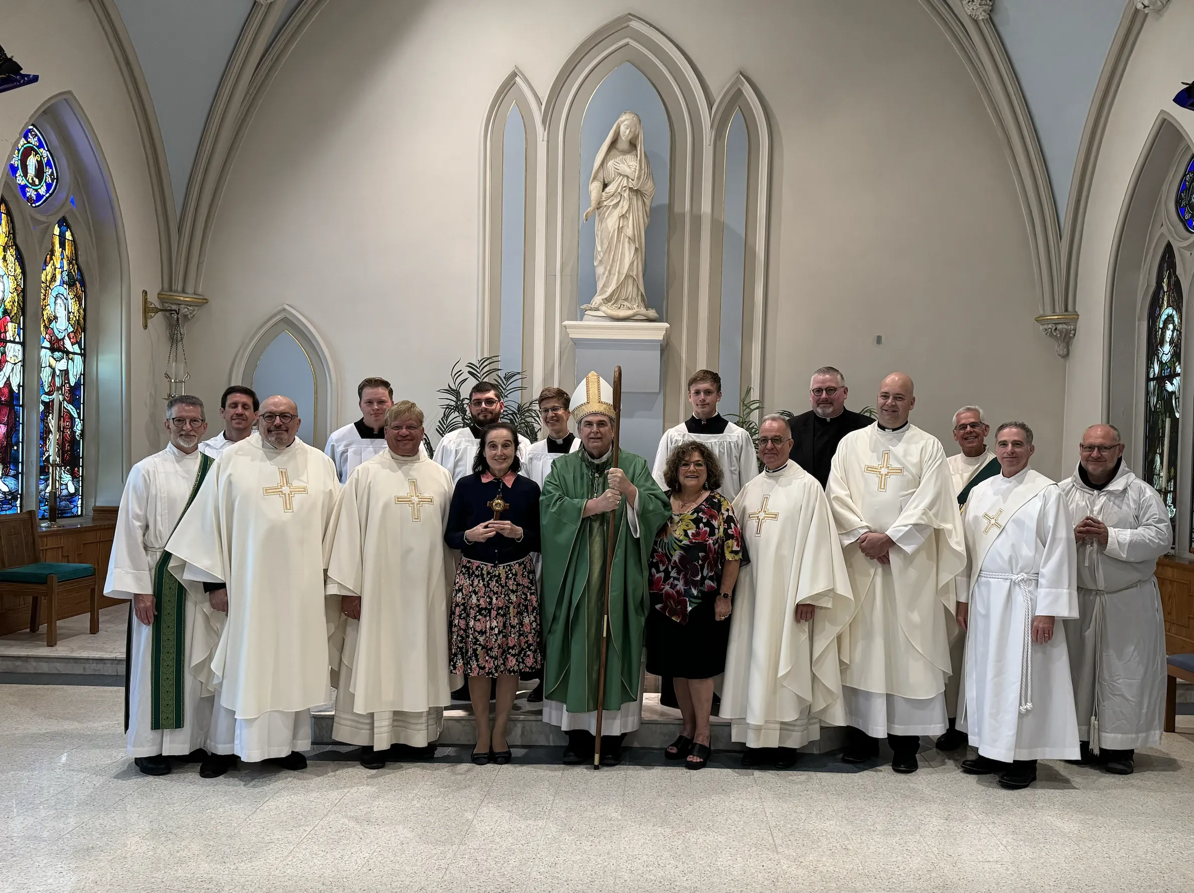 At the culmination of her visit to the Diocese of Buffalo, Gianna Emanuela Molla stands with the clergy who celebrated Mass at the St. Joseph Cathedral on July 14, 2024. Credit: Cheryl Calire