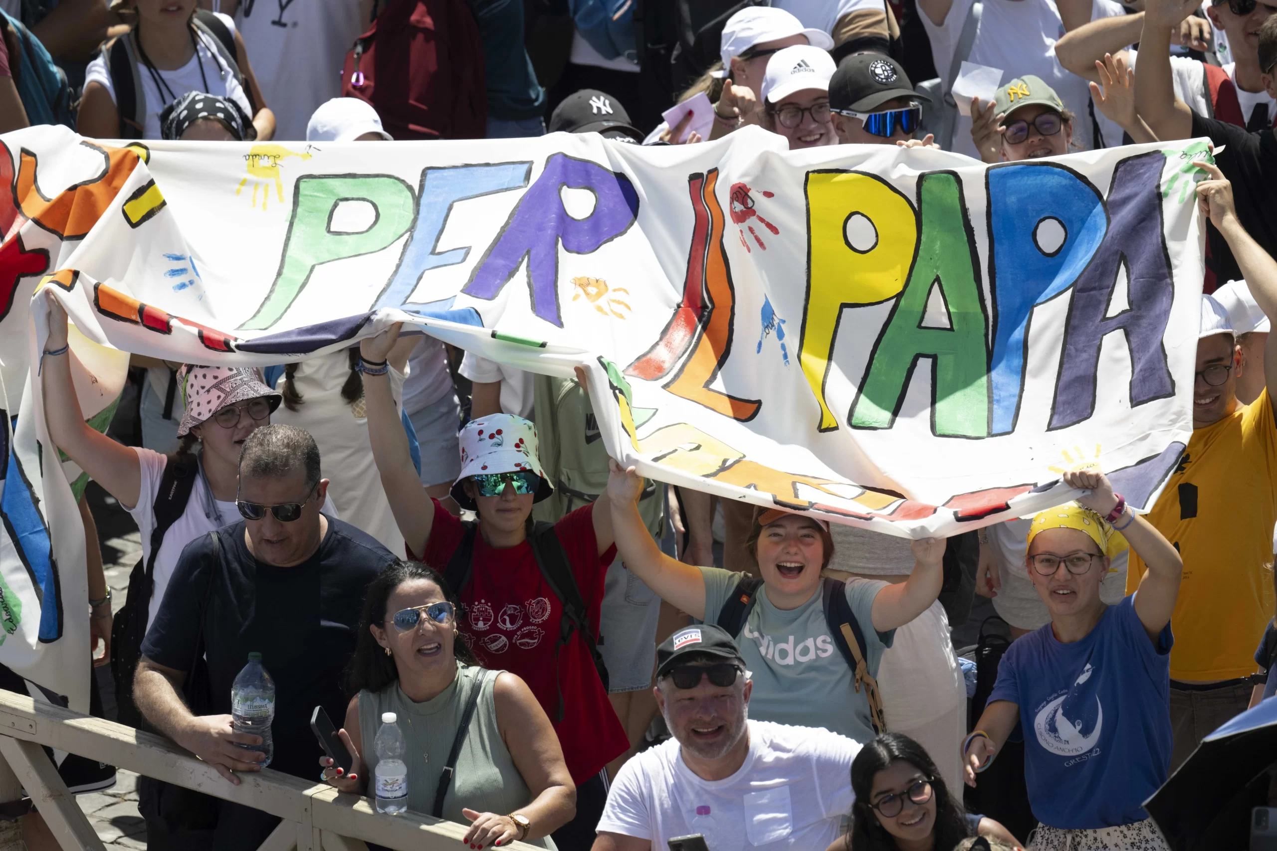 Pilgrims display a sign for Pope Francis at the Sunday Angelus in St. Peter's Square, Sunday, July 28, 2024. Vatican Media