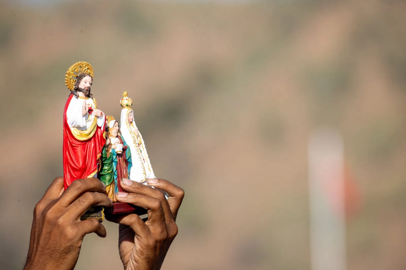 Religious figures are held aloft at Mass at the Esplanade of Taci Tolu in Dili, Timor-Leste, Tuesday, Sept. 10, 2024. Credit: Daniel Ibáñez/CNA