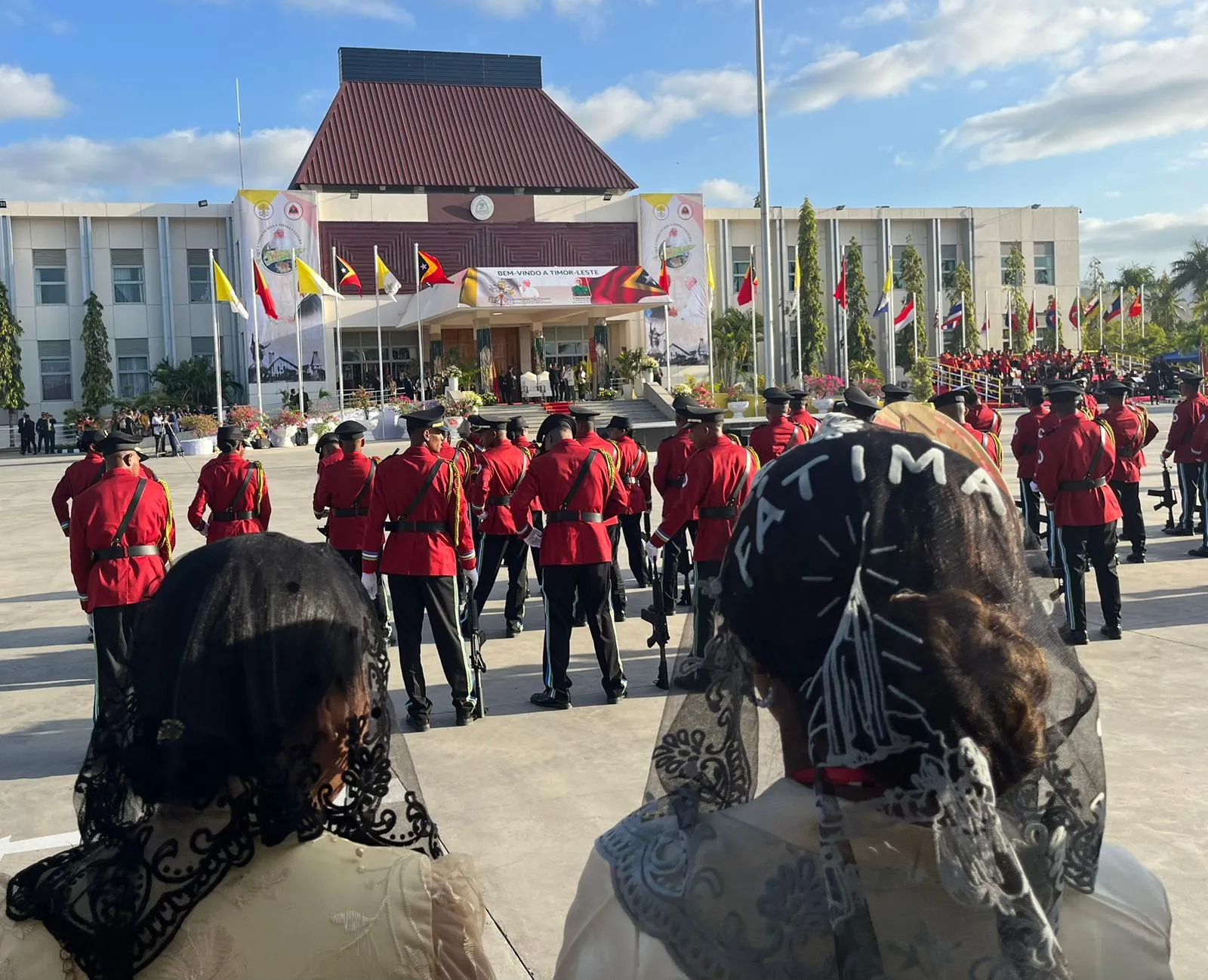 Women wear veils as they await the audience with the pope at the presidential palace in Dili, East Timor, on Sept. 9, 2024. Credit: Courtney Mares/CNA