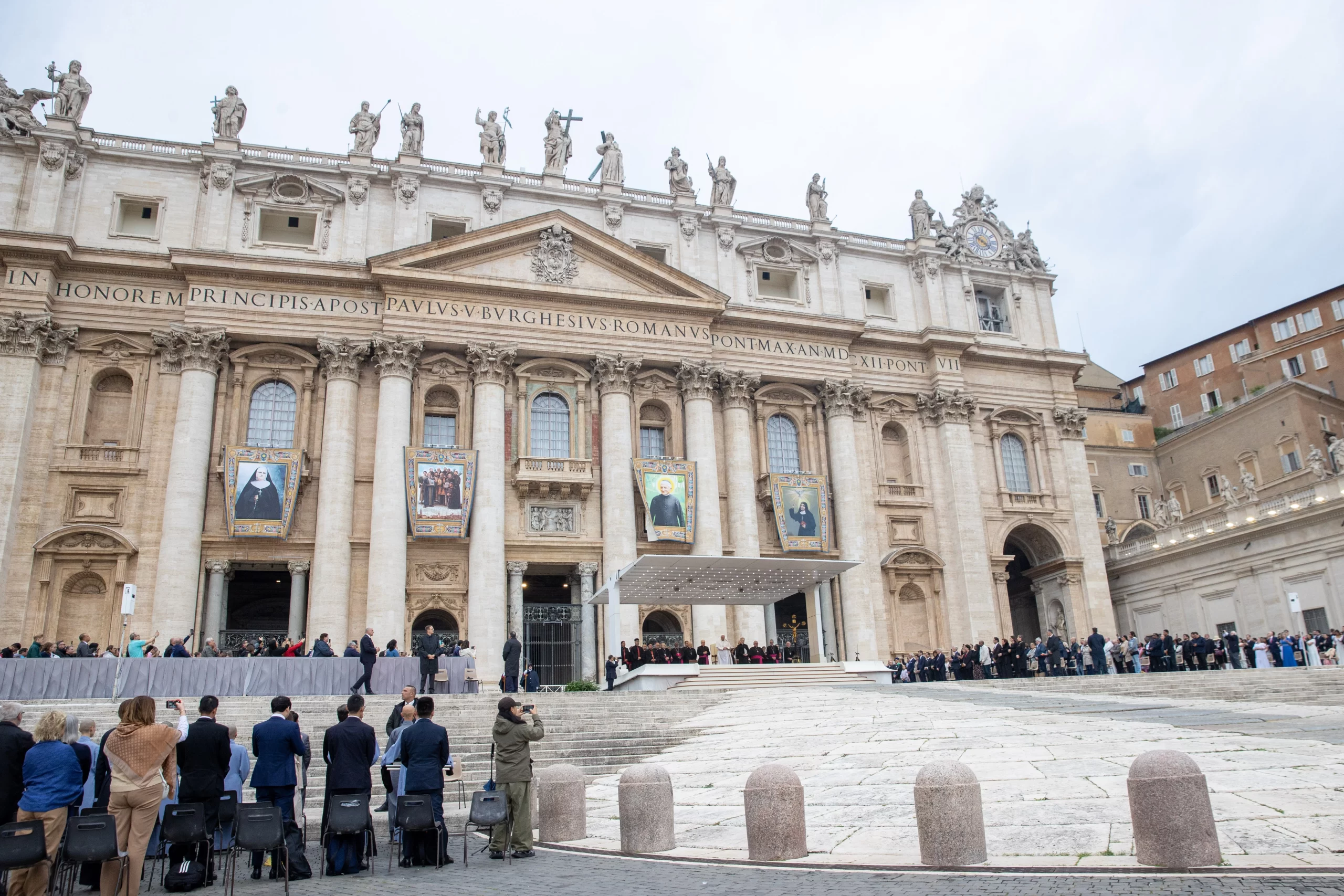 Pope Francis addresses pilgrims gathered in St. Peter’ Square, where banners of the saints canonized on Sunday are still displayed, for his general audience on Wednesday, Oct. 23, 2024, at the Vatican. Credit: Daniel Ibañez/CNA