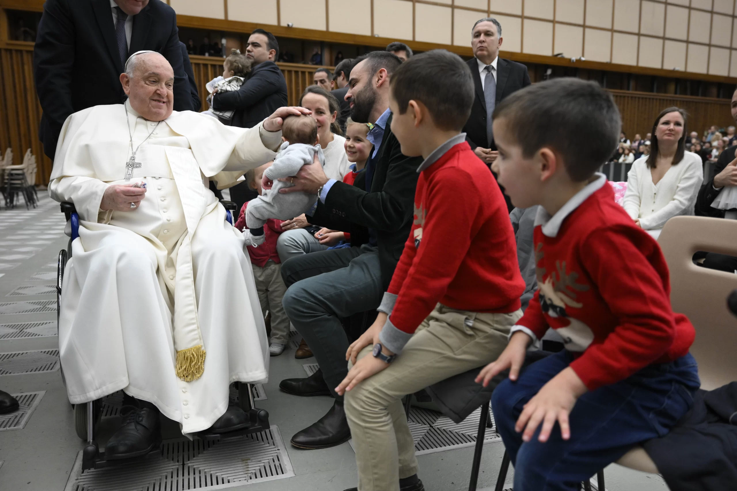 Pope Francis blesses a baby during his general audience in the Vatican's Paul VI Hall, Wednesday, Jan. 29, 2025. Credit: Vatican Media