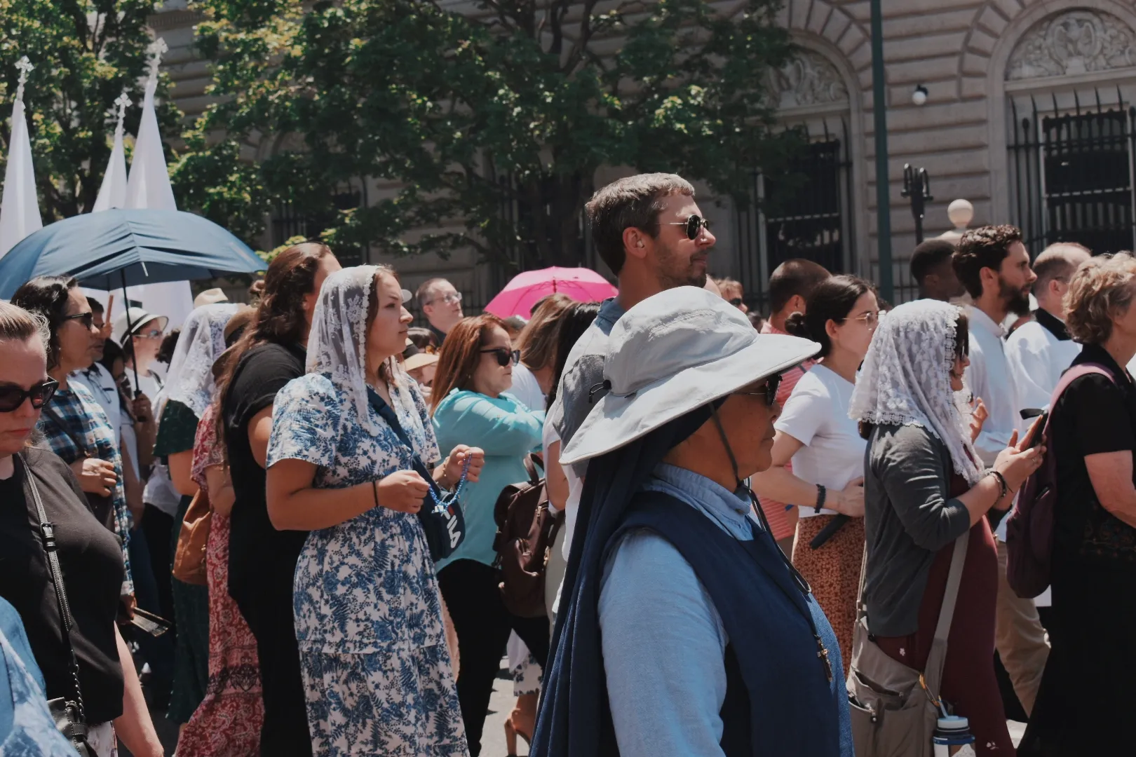 Sister Mary Rose Chinn (in foreground), a sister of the Handmaids of the Triune God, walks in the Eucharistic procession through Denver on June 9, 2024. Credit: Kate Quiñones/CNA