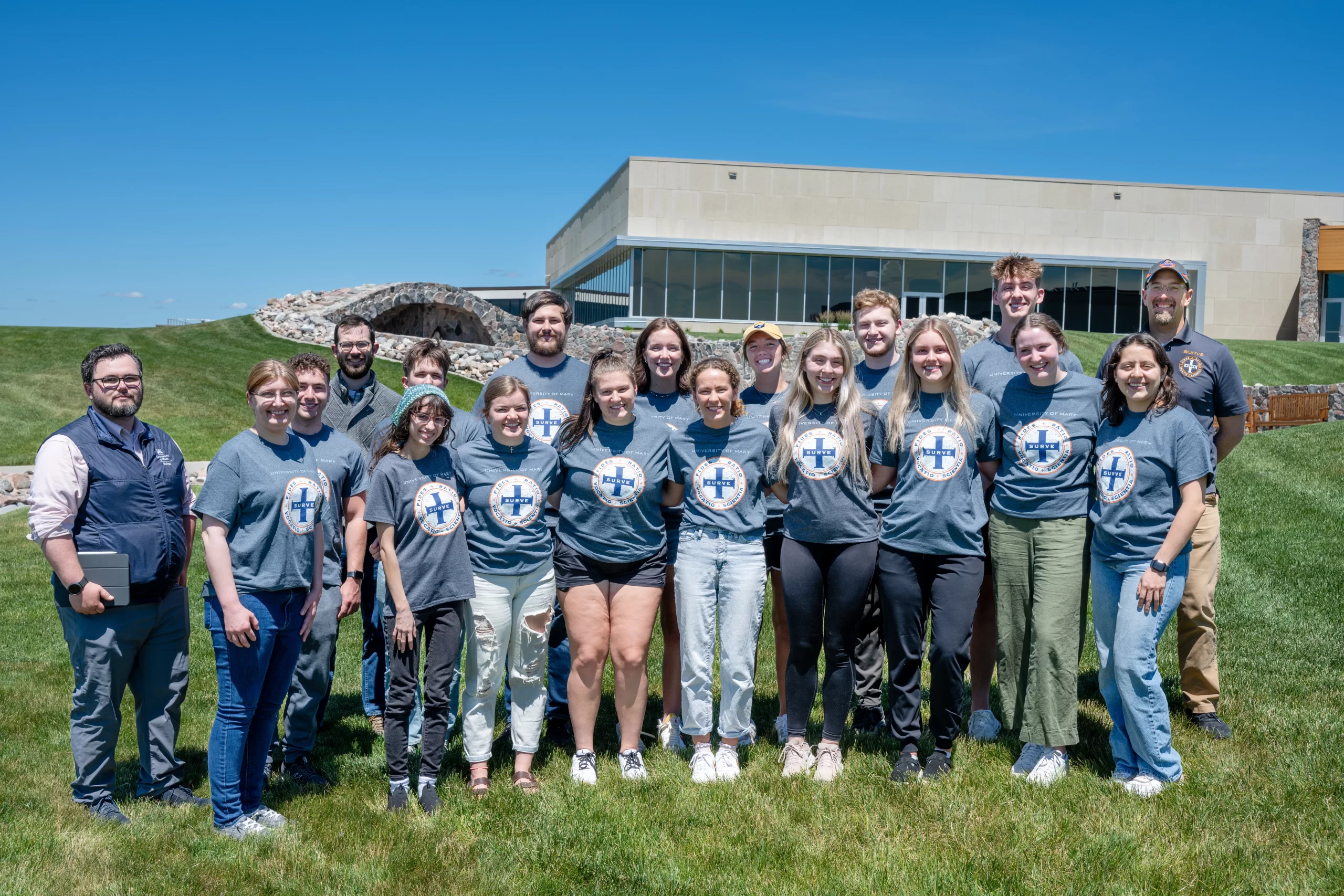 SURVE students at the University of Mary take time for a group photo following daily Mass and a barbecue lunch on campus. Margaret Talafuse is pictured in the front row, second from the left. Credit: Tom Ackerman/University of Mary