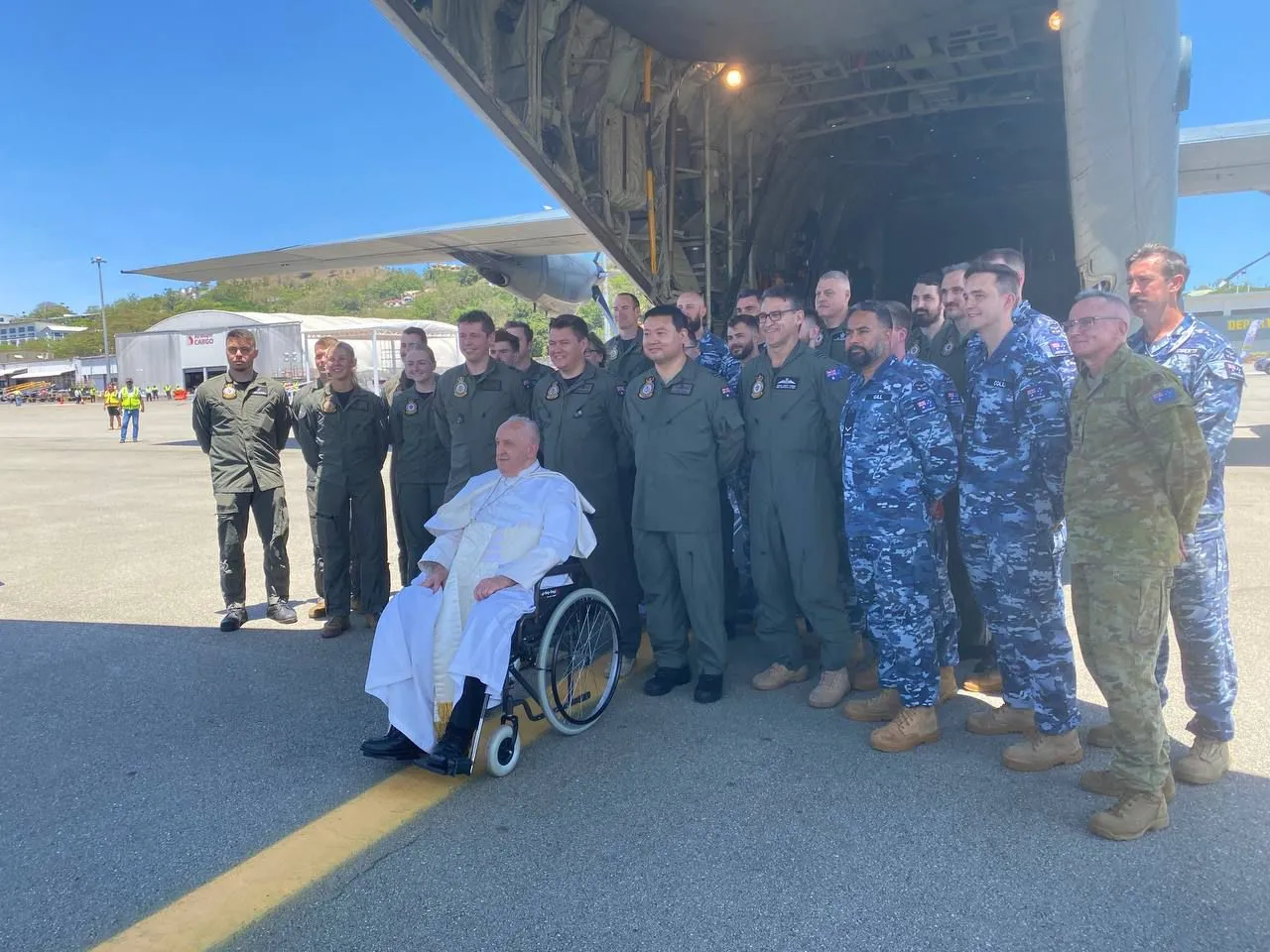 Pope Francis boards a flight of the Royal Australian Air Force from Port Moresby to the remote town of Vanimo, Papua New Guinea. Credit: VAMP Pool